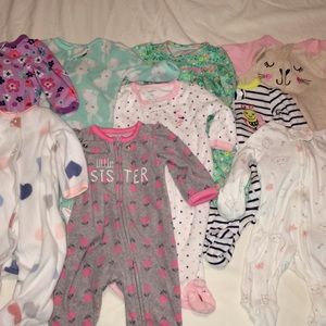 Lot of 9 newborn pajamas Carter’s & Garanimals